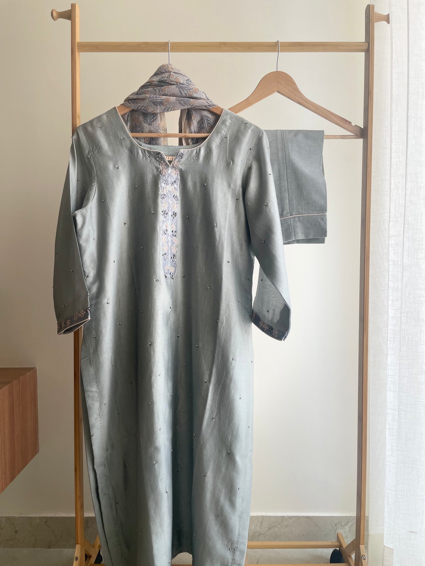 Grey suit with floral thread embroidery