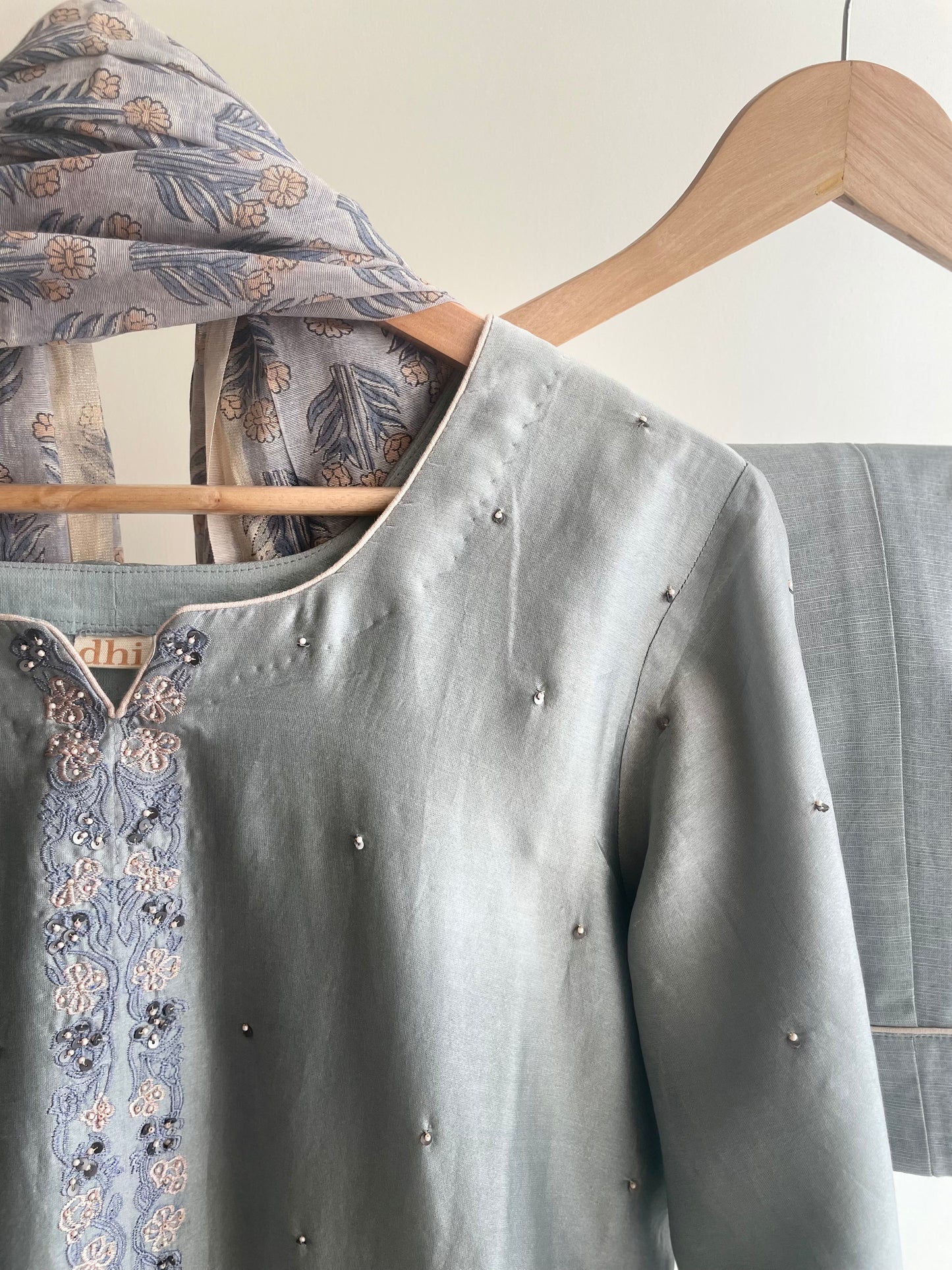 Grey suit with floral thread embroidery