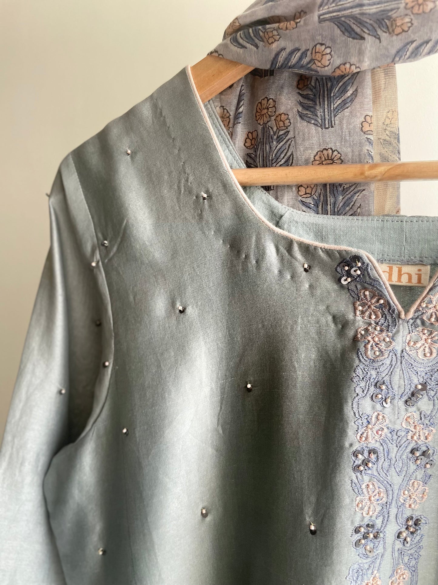 Grey suit with floral thread embroidery