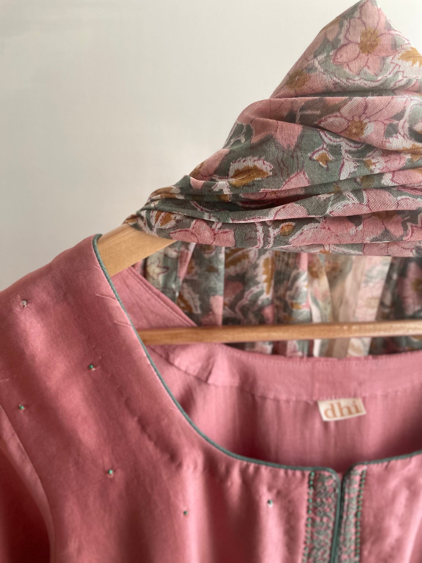 Pink suit with floral thread embroidery
